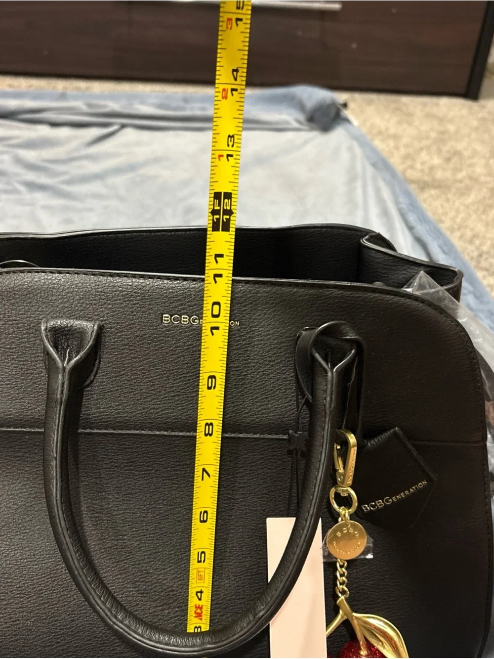 BCBGeneration Black Faux Leather Satchel with Red Cherry Charm